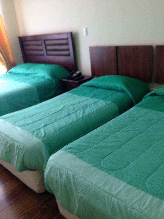 Hotel Costa Bahia Пуэрто-Монт Номер фото